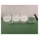 Glass jars, 3 white lids 1 black lid