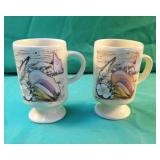 Set of 2 coffee cups with sea shells design. 5"