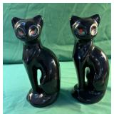 2 cat statues 8.5" tall. Has a tiny place on ear