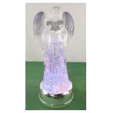 Plastic battery powered light up snow globe