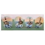 Lot of 4 collectible light house and dolphin