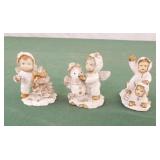 Set of 3 Christmas snow kid figurines. 2.5" tall