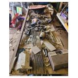 Table made out of buck saws, plywood and metal