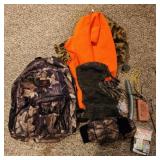 Winchester camo soft backpack with hunting gear,
