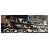 Everything on shelves on right - spray paint, misc