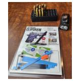 Empty 223 casings, coleman mini flashlights,