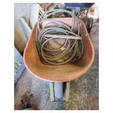 Wheel barrow and hose