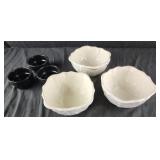 3 white lettuce bowls, and 3 black sauce bowls