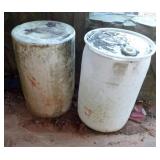 2 white barrels. 1 with lid missing cap
