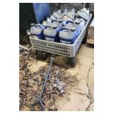 Crate cart and oil jugs