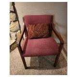 Burgundy chair with pillow
