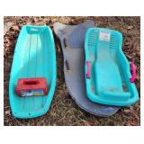 3 sleds and snow block mold