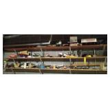 Everything on shelves on left - camp propane,