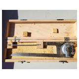 Precision caliper with magnifying eye in case