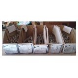 Misc pegs for pegboards. Opened boxes