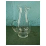 Clear glass water pitcher with R engraved