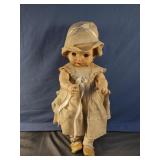Vintage plastic baby doll with closeable eyes and