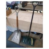 2 snow shovels. 1 plastic and 1 metal