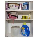 Contents of Shelves- Detergent,  Roll of Clear