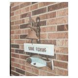 Horse bell rusty and gone fishing sign