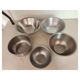 Various sized Metal bowls