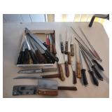 Assortment of knives and sharpeners