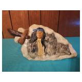 Native American With Wolves On A Arrowhead,
