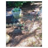 Metal wagon plant stand with plants