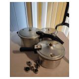 3 pressure cookers