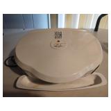 George Foreman lean mean fat grilling machine.