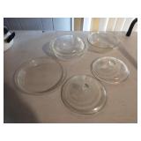 Glass casserole dishes, lids and a pie dish