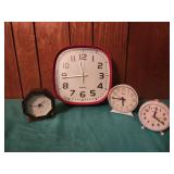 Wind up Alarm clocks and a wall clock