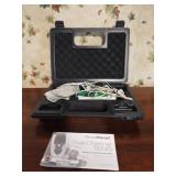 AccuRelief Dual Channel TENS. Powers on in case