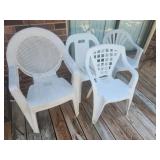 White plastic outdoor chairs