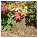 Unique piece of wood with a flower pot