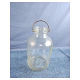 Vintage glass jug with metal handle