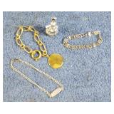 3 bracelets and an angel ornament