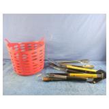 Grill utensils and a plastic basket