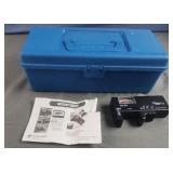 Plastic tool box with batteries and a battery