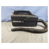 Oreck XL Type 3 hand held vacuum. Powers on