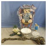 Home decor including decorated stuffed bear in a
