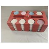 Poker chips in a wood organizer