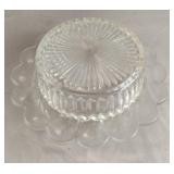 Round glass cheese dish with lid. Has small chip