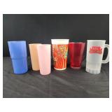 3 Tupperware cups, plastic coca cola, red cup,