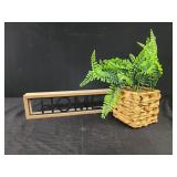 Home sign and faux plant