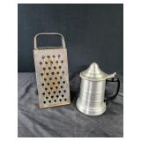 Bromco grater , clear bottom stein