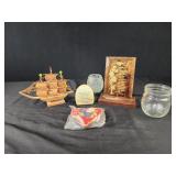 Embroidered heart ornament,  jar, wooden ship.