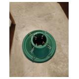 Plastic tree stand 19" across