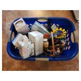 Laundry basket filled with assorted bathroom