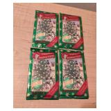 Christmas trading cards. Unopened. 4 sets